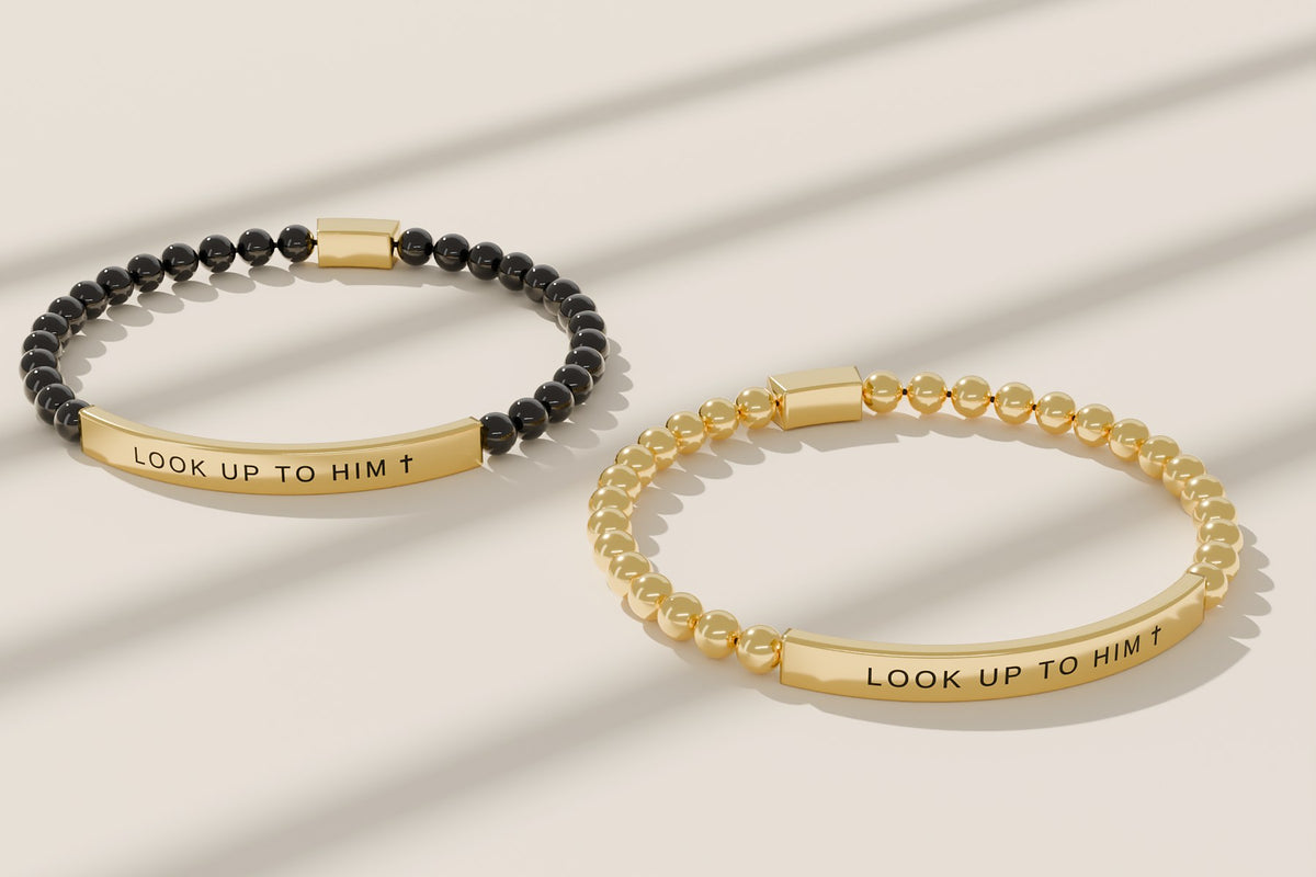 Look Up to Him bracelets in black and gold