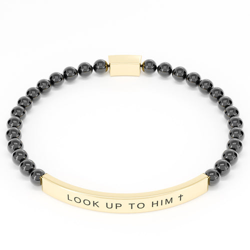Look Up to Him cross bracelet in Black & Gold on white: black 4mm beads with a curved gold engraved bar