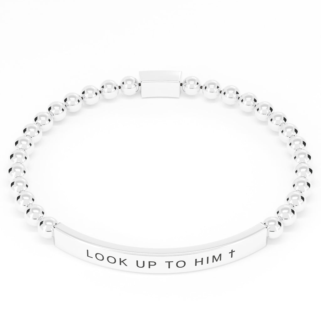 Look Up to Him cross bracelet in Silver on white: polished stainless steel beads and engraved bar