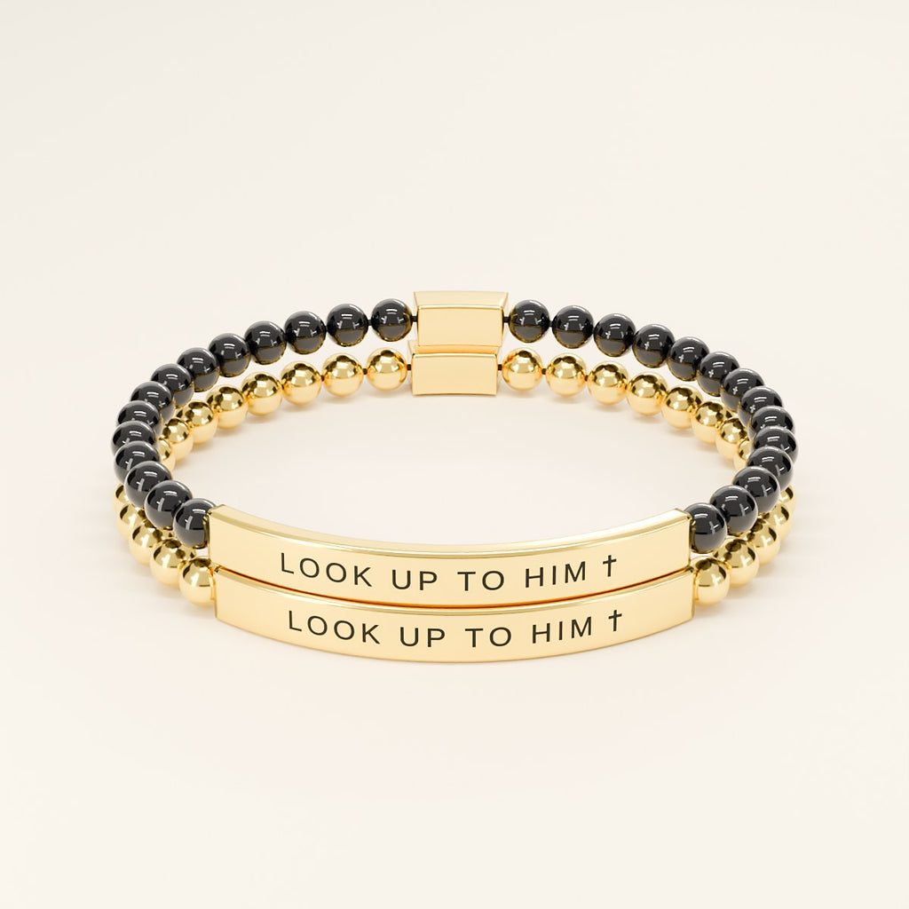 His and hers Look Up to Him bracelets: Black & Gold with Gold