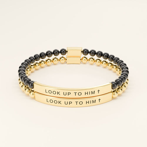 His and hers Look Up to Him bracelets: Black & Gold with Gold